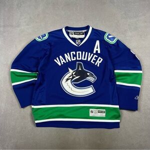 Reebok Blue and Green Vancouver Canucks Hockey Jersey NHL